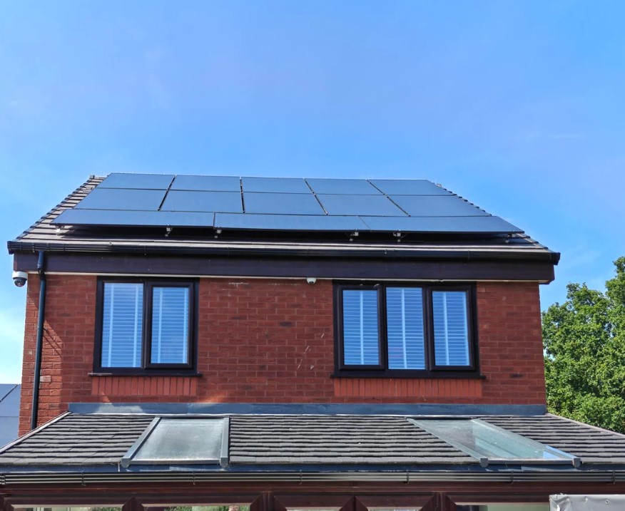 The reverse angle of the house, showing more solar panels.