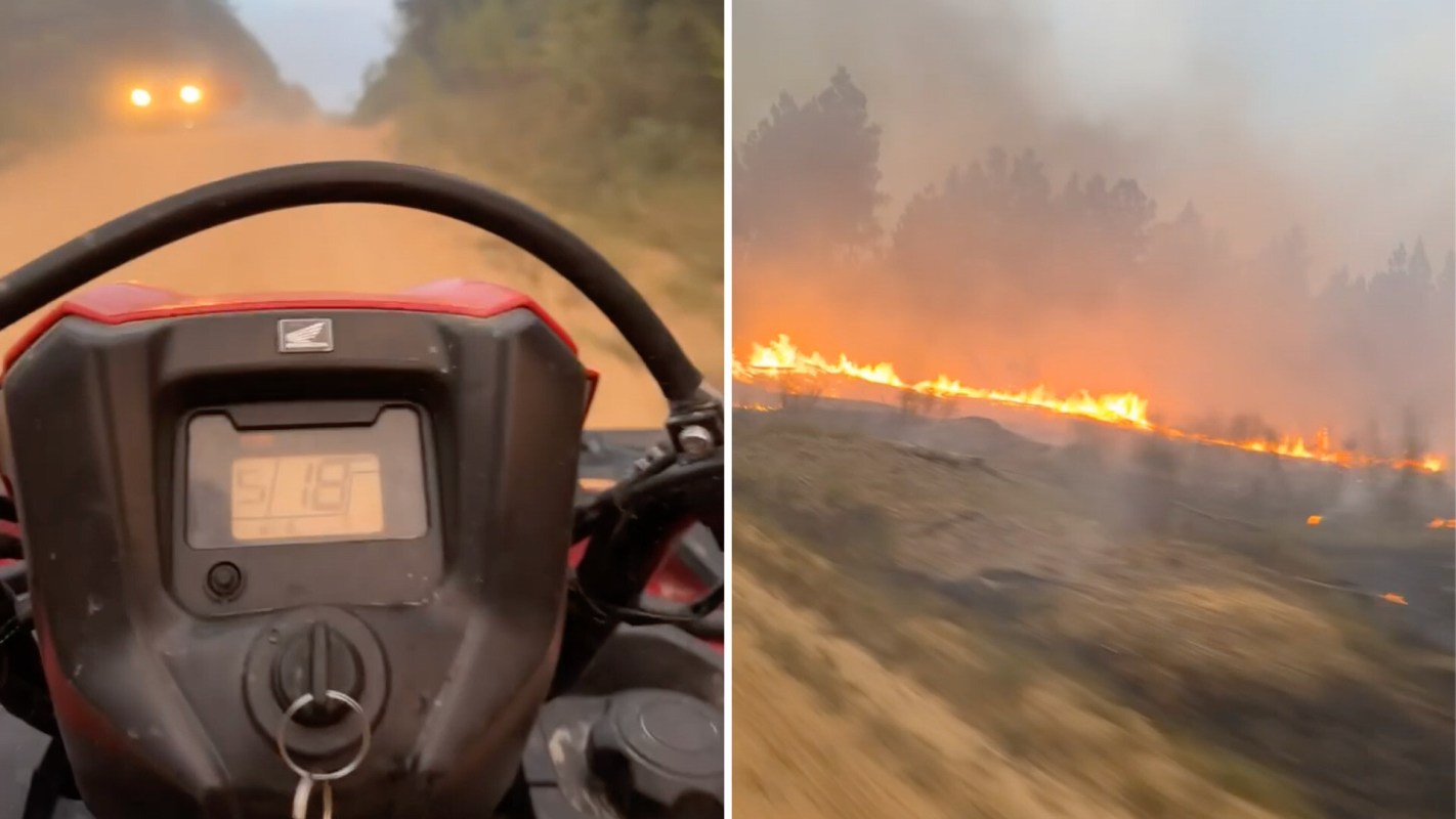 A person fleeing a wildfire on an ATV.