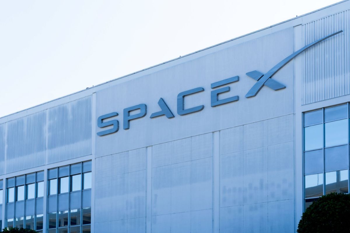 The SpaceX logo on a building.