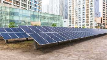 Mounted solar panels on a flat roof.