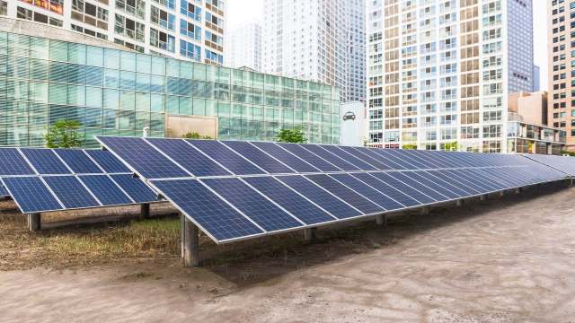 Mounted solar panels on a flat roof.