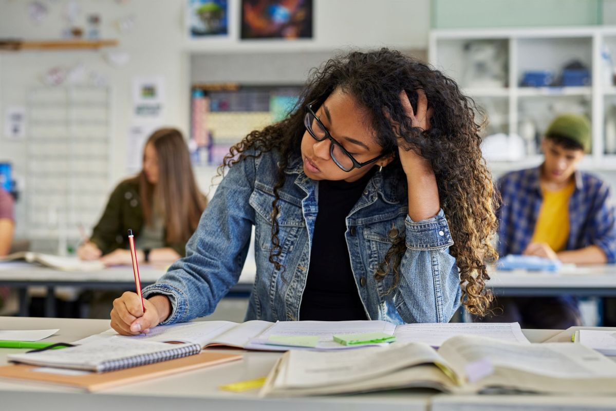 A student taking notes.