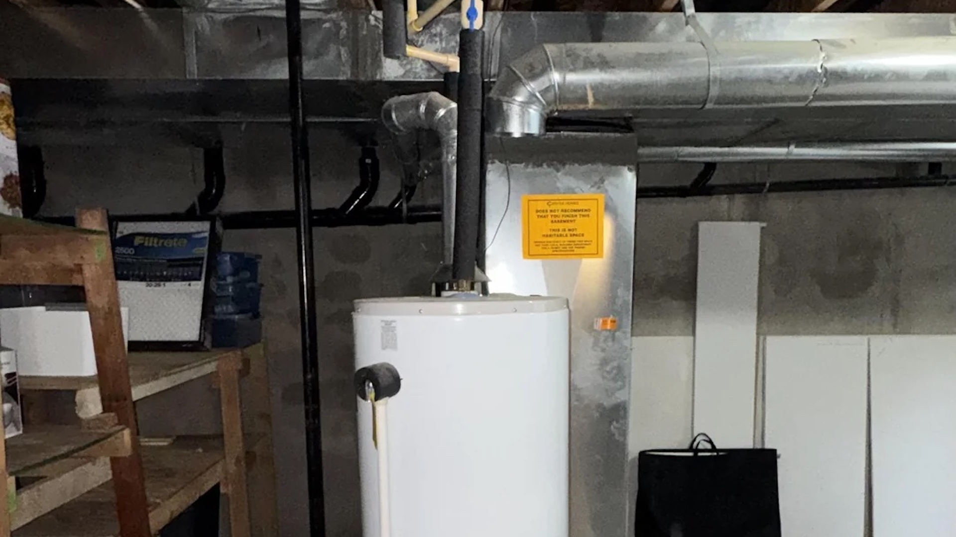 New heat-pump water heater turns simple swap into a plumbing puzzle over side-mounted ports