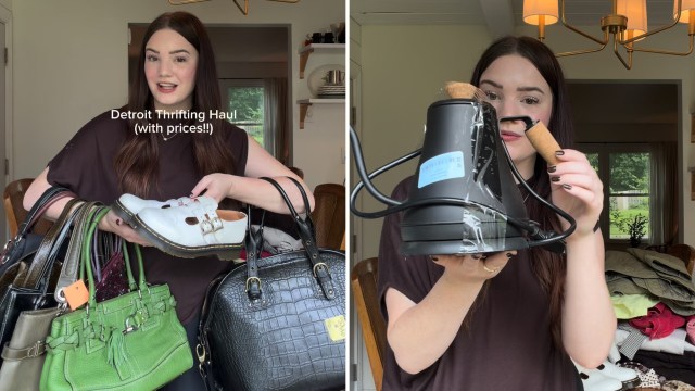 A person holds several bags and a pair of shoes while displaying a black watering can in a room with disorganized items.