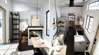 A modern kitchen and dining area with a wooden table, shelves, and a ladder leading to a loft space.