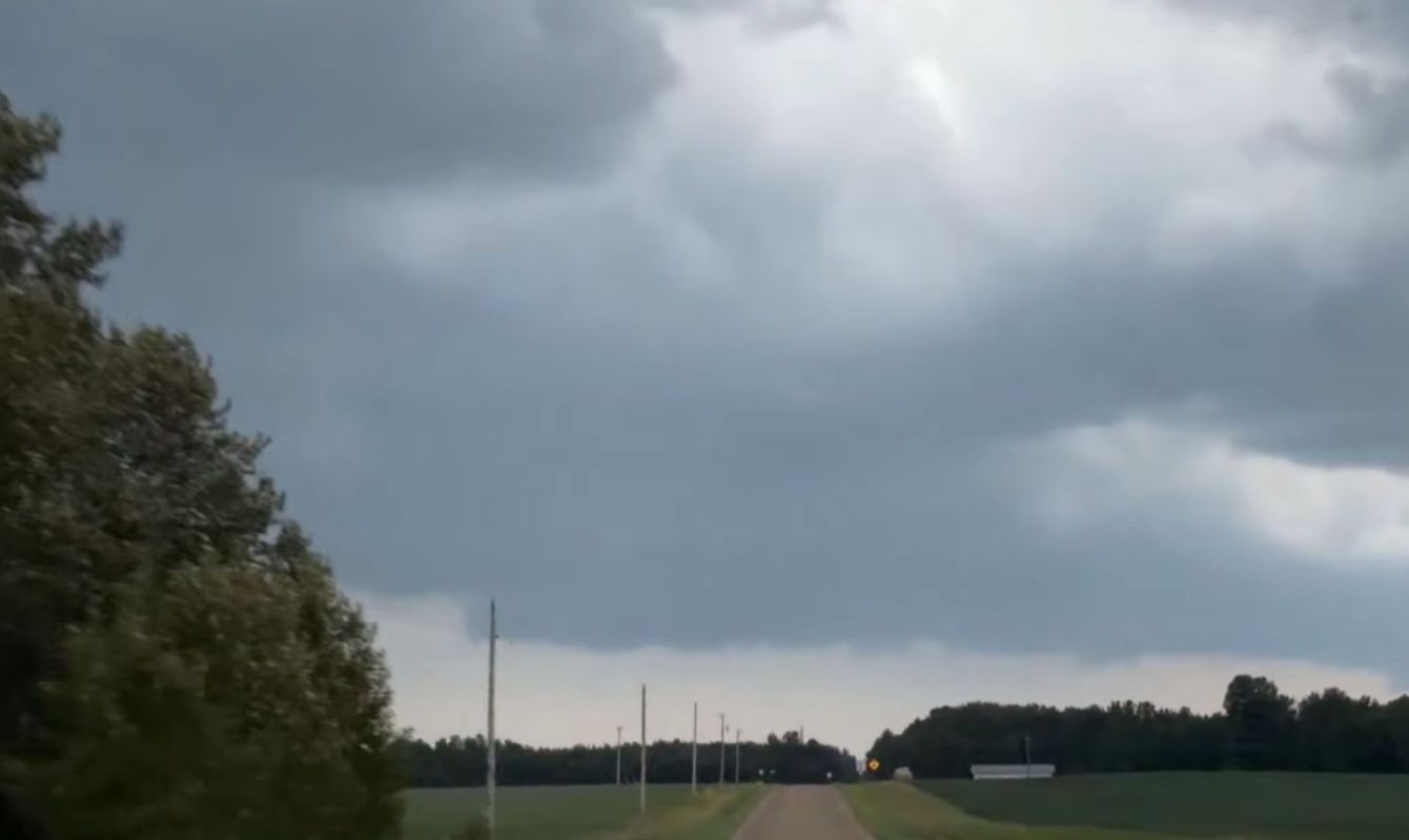 Storm clouds above a road.