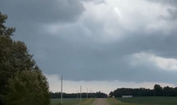 Storm clouds above a road.