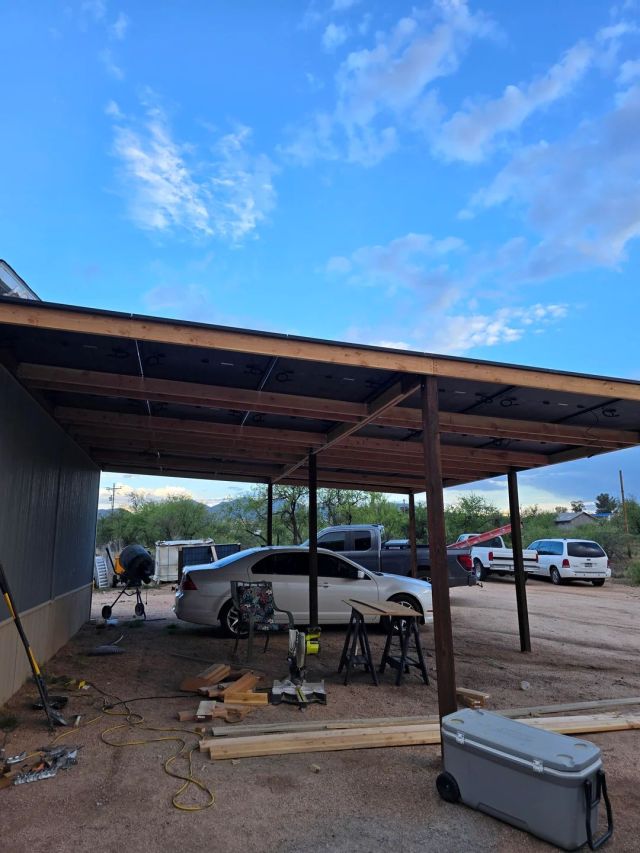 The underside of a roof with solar panels.