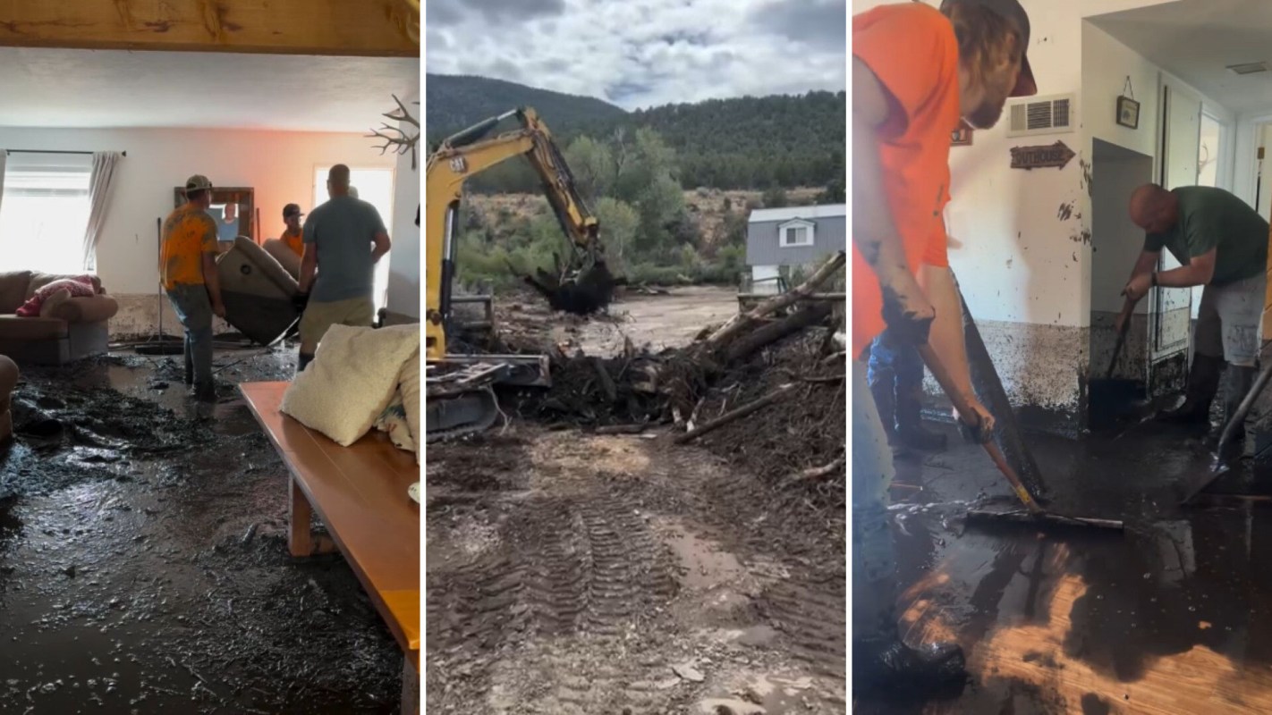 A crew cleaning mud from a cabin.