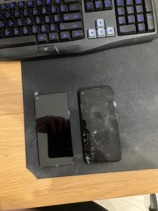 Two phones, one with a broken screen.