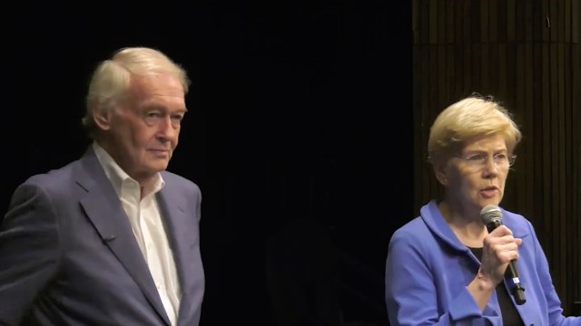 U.S. senators Ed Markey and Elizabeth Warren speaking stage.