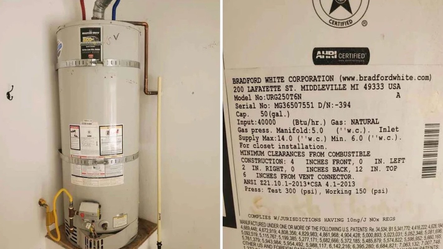 A gas water heater with identification labels and installation instructions displayed on a wall.