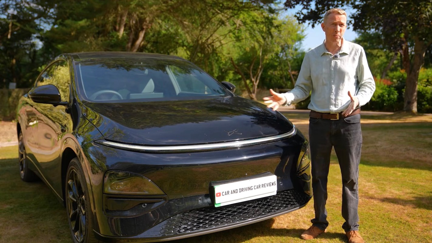 Car reviewer Jonathan Crouch next to an XPeng G6.