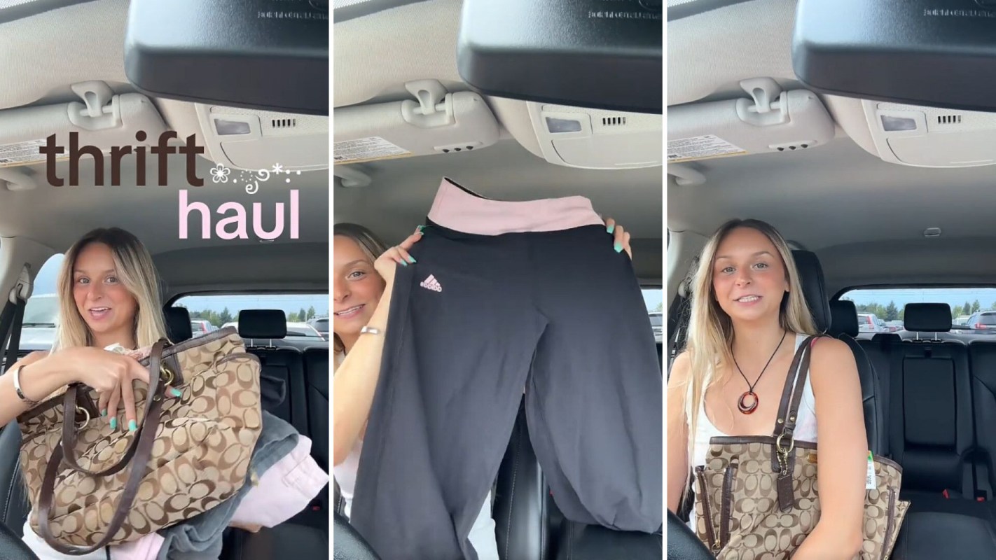 A thrifter showing off her haul, including pants and a purse.