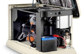 An open generator showing internal components including an engine, battery, and electrical wiring.