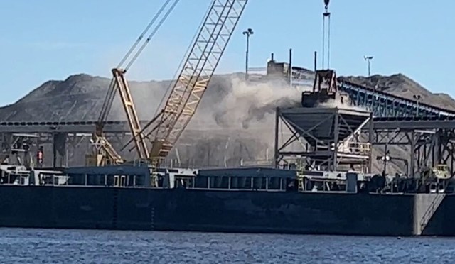A barge at an industrial site.