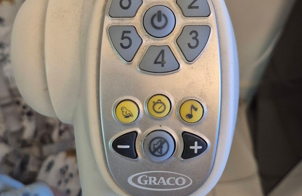 A Graco baby swing remote.