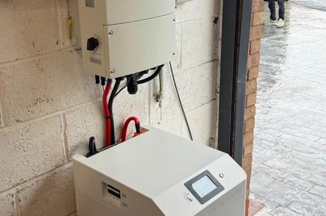 A wall-mounted inverter and battery unit.