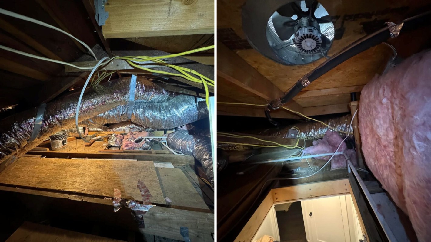 An attic space featuring ductwork, electrical wiring, and insulation materials.