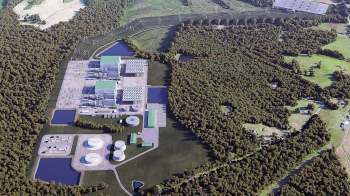 An aerial view of an industrial facility surrounded by dense forests and water bodies.