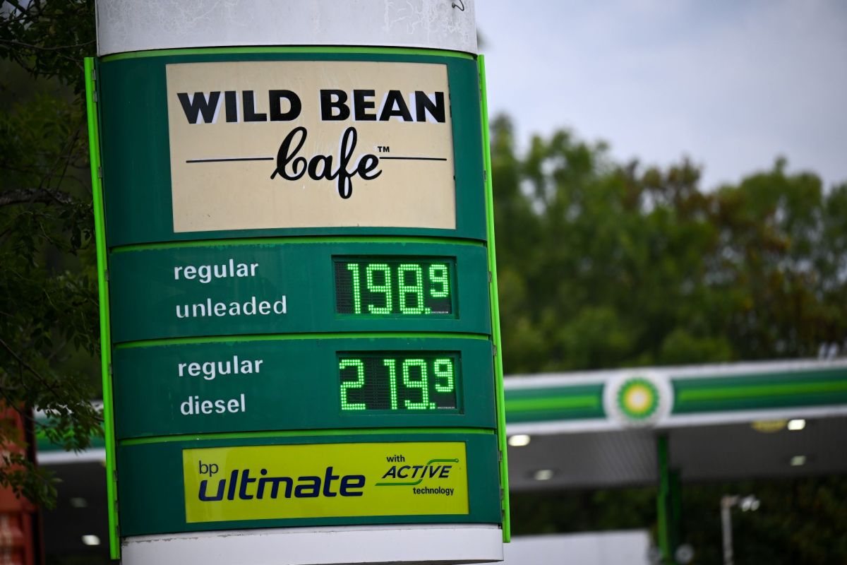 A gas station sign in England displays the gas prices