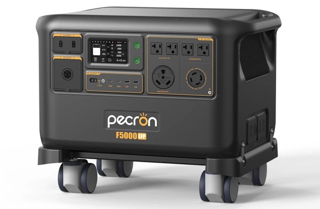 A portable power station with multiple charging ports and wheels for mobility.