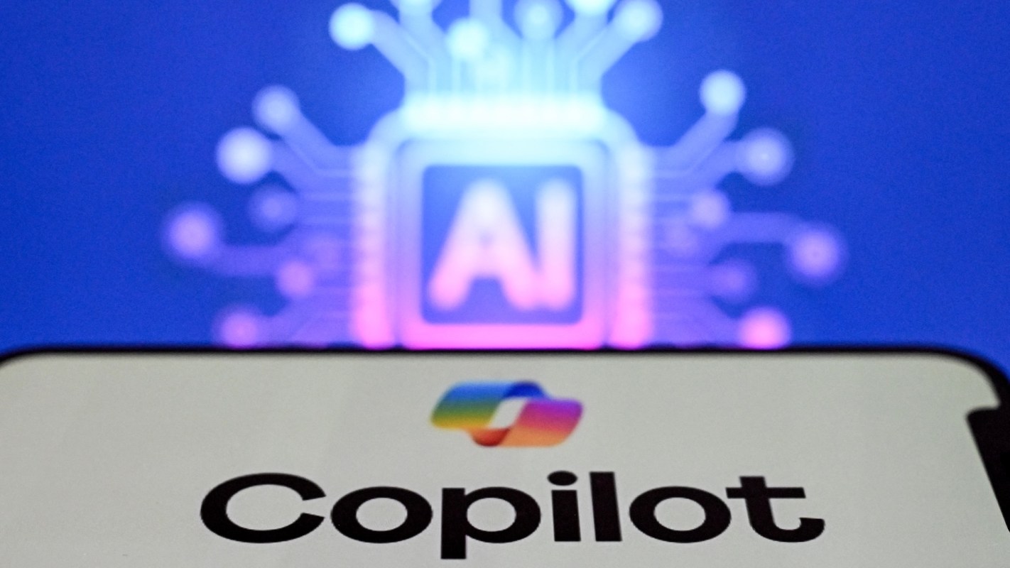 A smartphone displaying the word "Copilot" with an abstract AI circuit background.