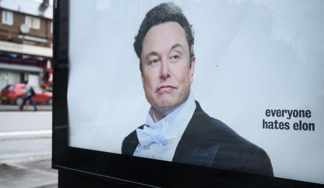An "Everyone Hates Elon" poster of Elon Musk.