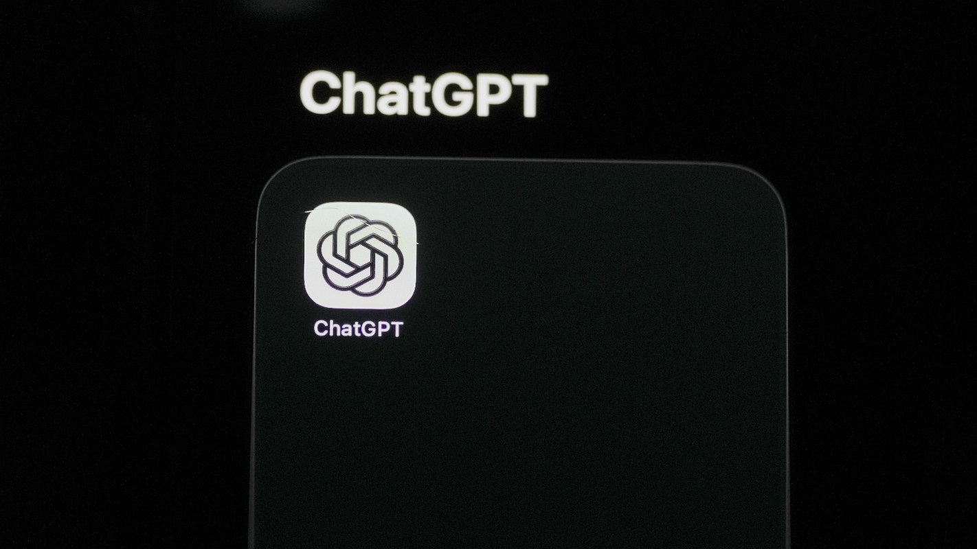 ChatGPT app icon displayed on a smartphone screen in a black background.