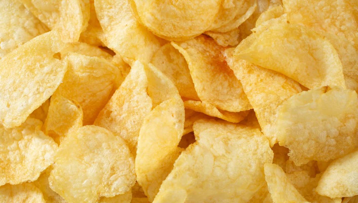 A pile of golden potato chips.