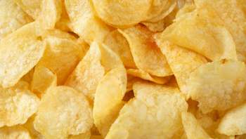 A pile of golden potato chips.