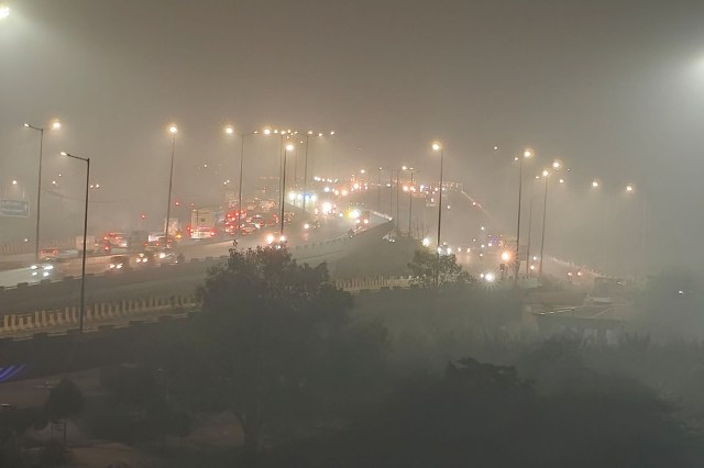 Air pollution over a highway in New Delhi.