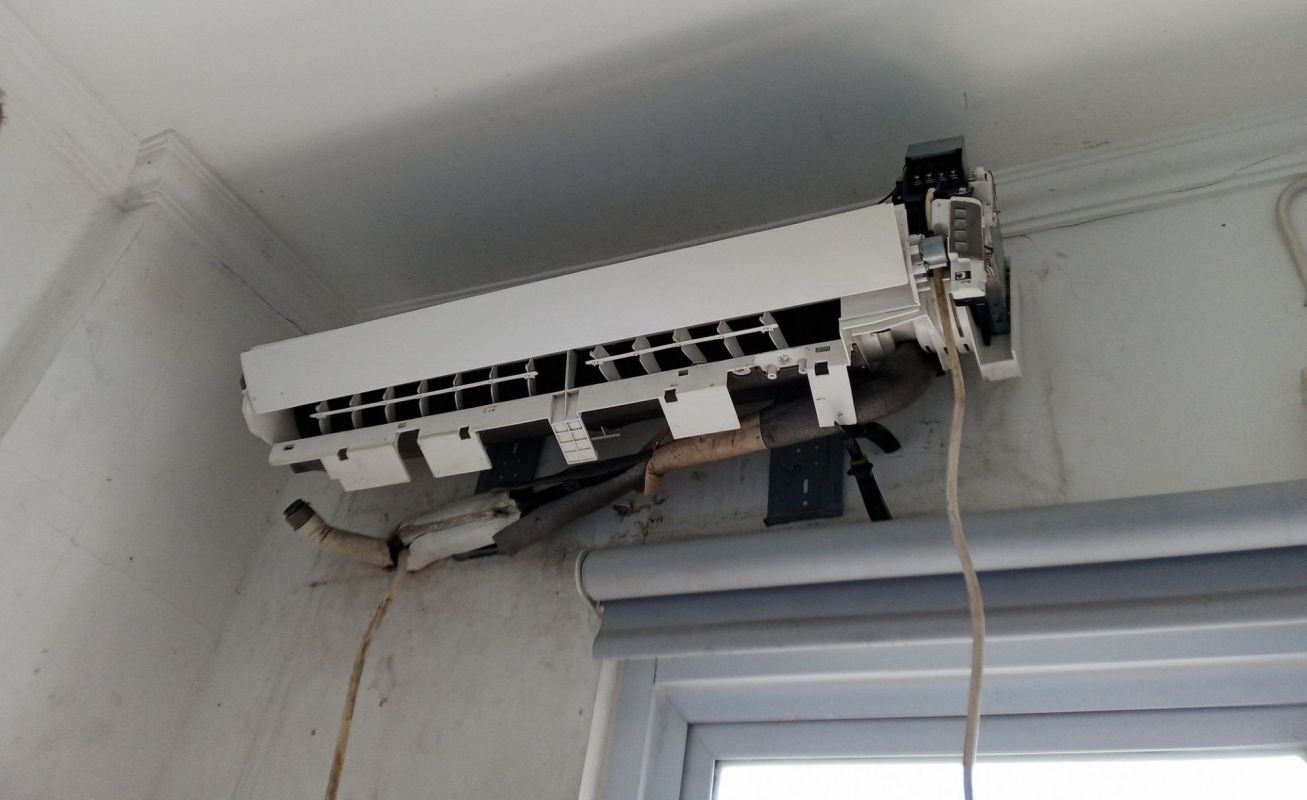 An AC unit in need of repair.