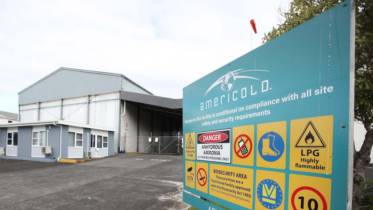 A sign for Americold highlighting safety and security requirements for the facility.