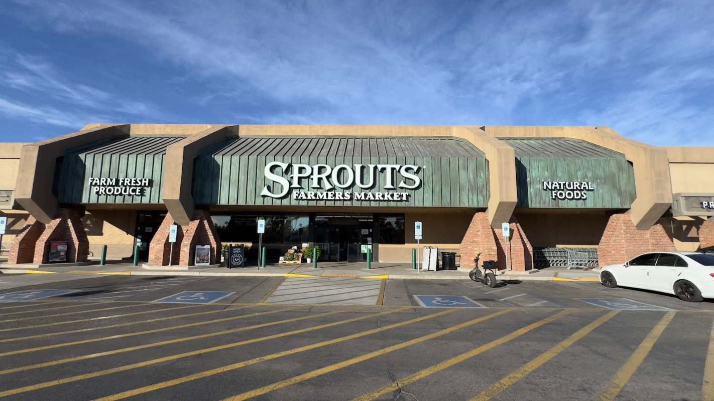 A Sprouts Farmers Market building with signs for produce and natural foods.