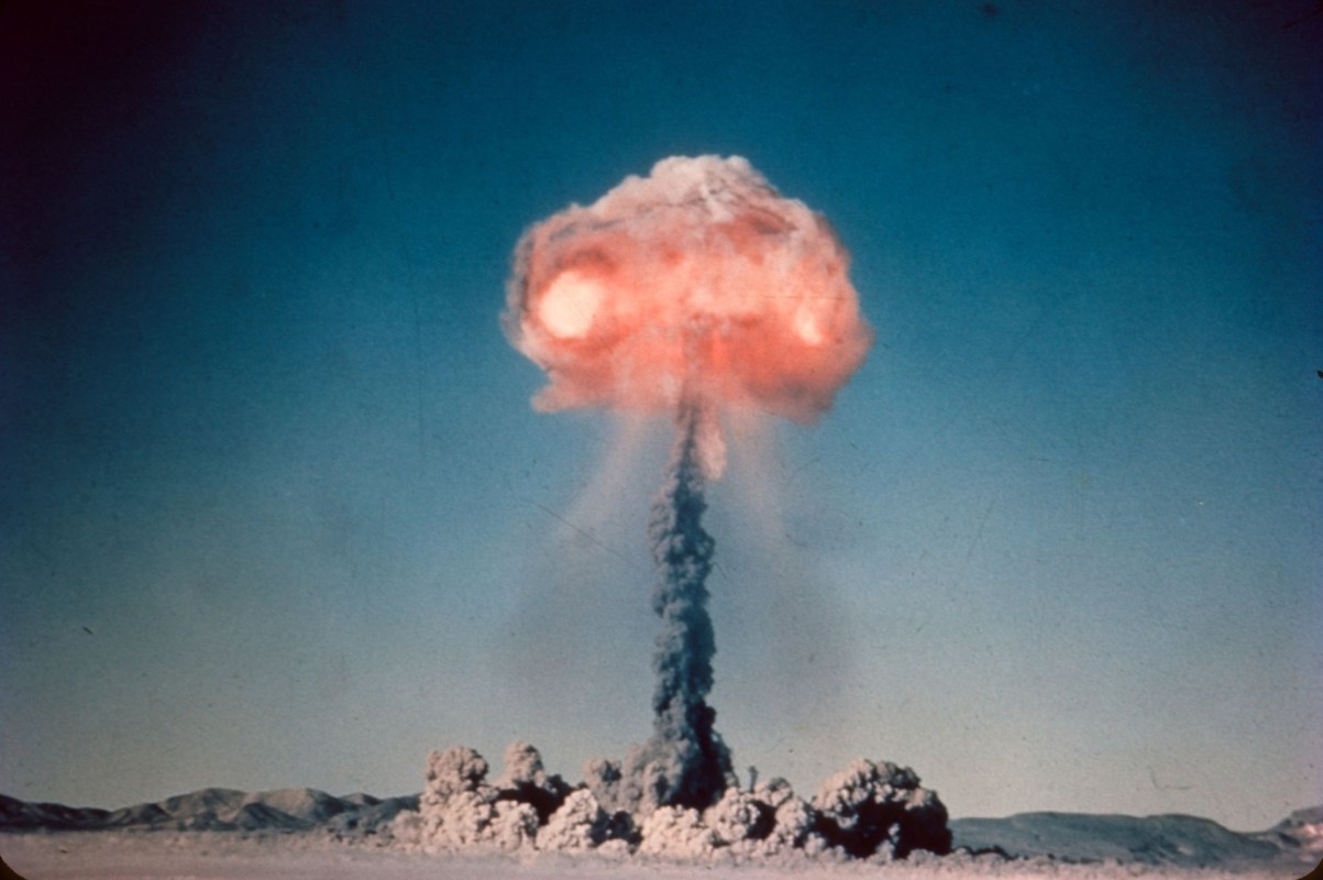 Atom bomb explosion and mushroom cloud.