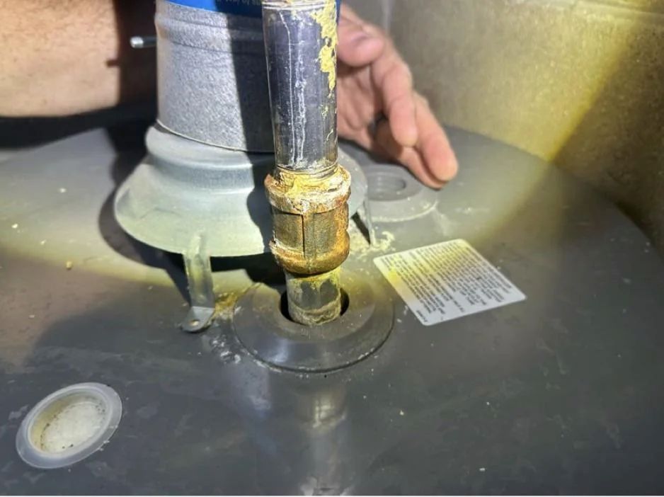 A backdrafting water heater.