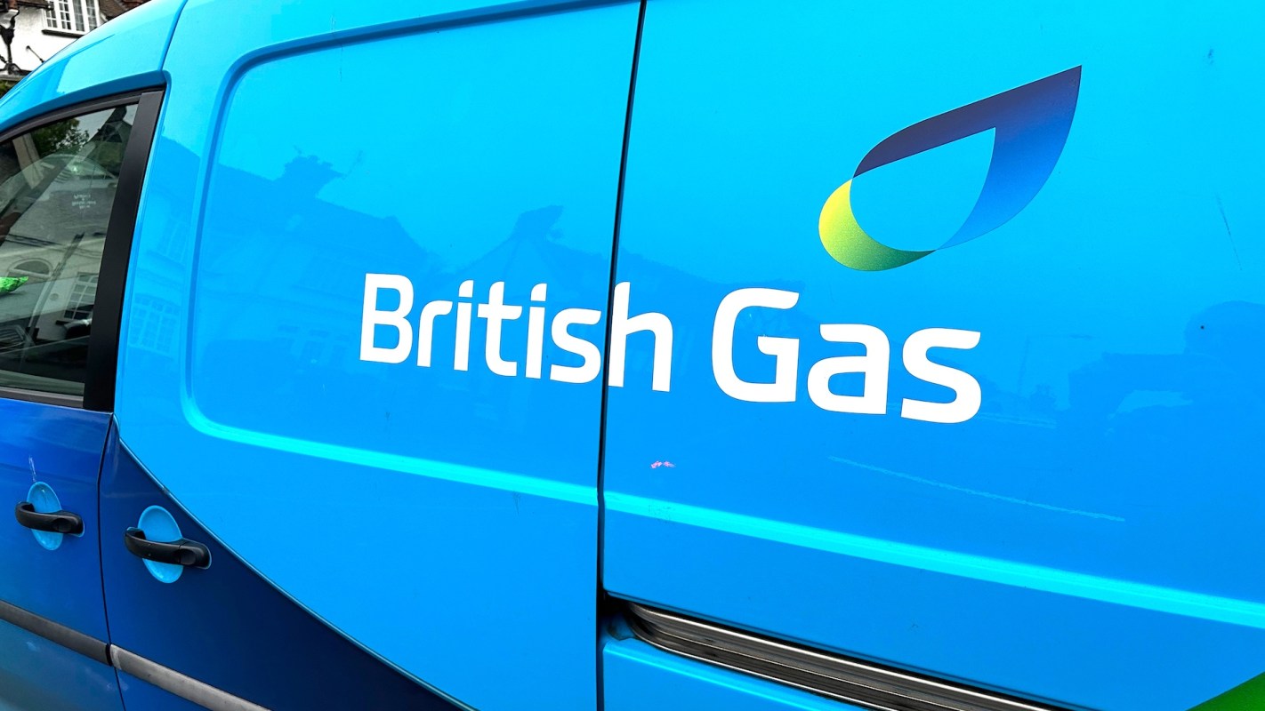 A blue vehicle with the logo and name of British Gas displayed on the side.