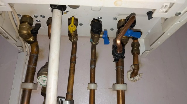 Pipes connected to a boiler.
