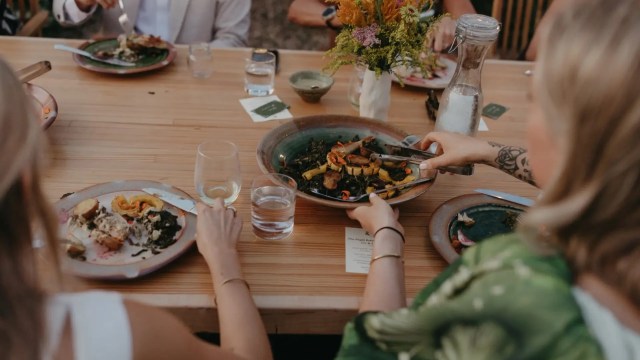 People at a dinner table.