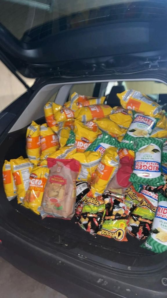 Many chip bags in a car.