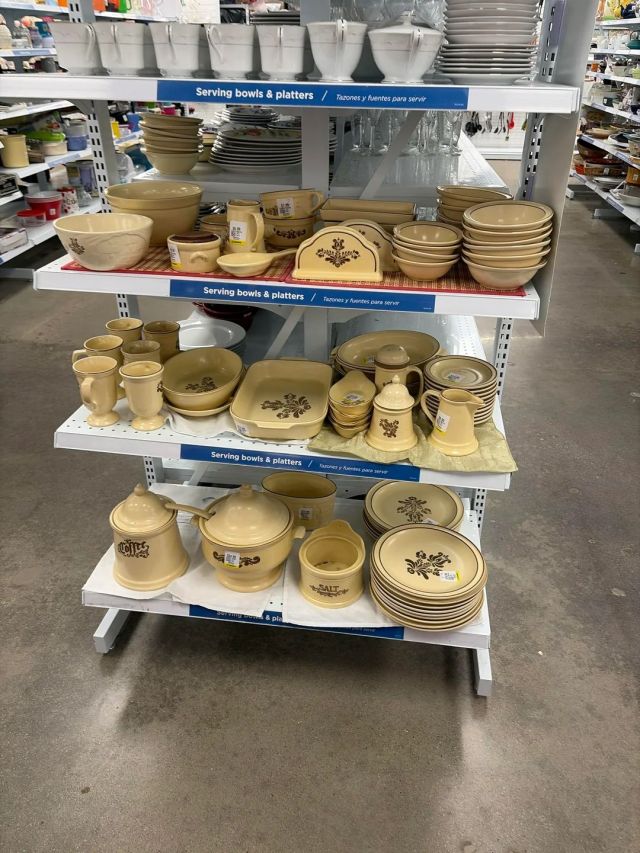 A complete kitchen set at a thrift store.