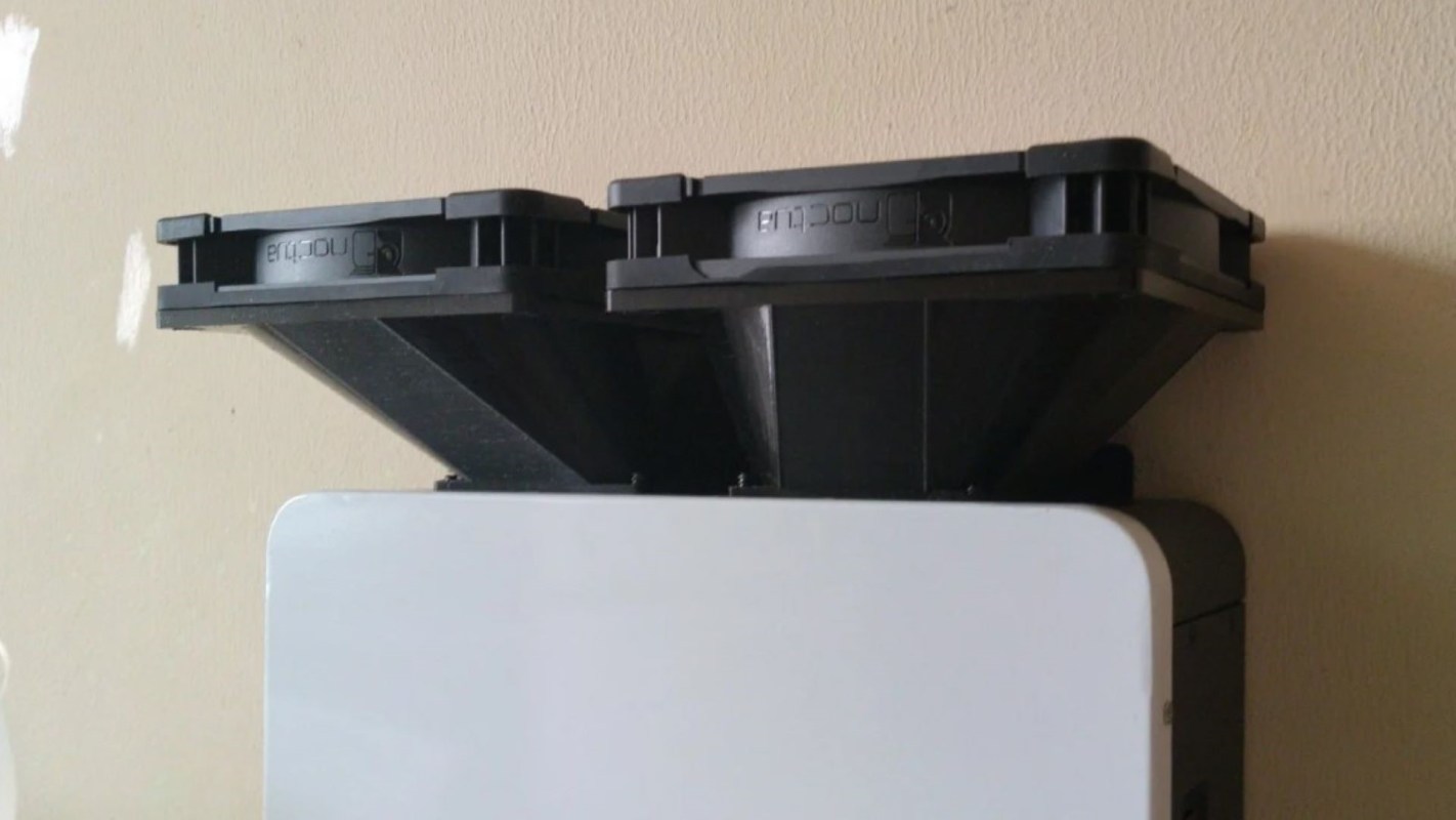 Two black fans on an inverter.