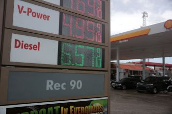 A sign showing $6.57 as the price of diesel fuel at a Shell gas station.