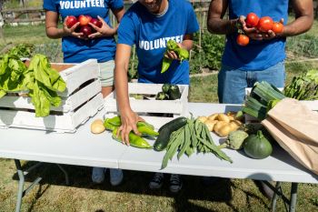 Volunteers sorting fresh produce.