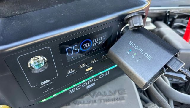 An EcoFlow power bank charging a car battery.