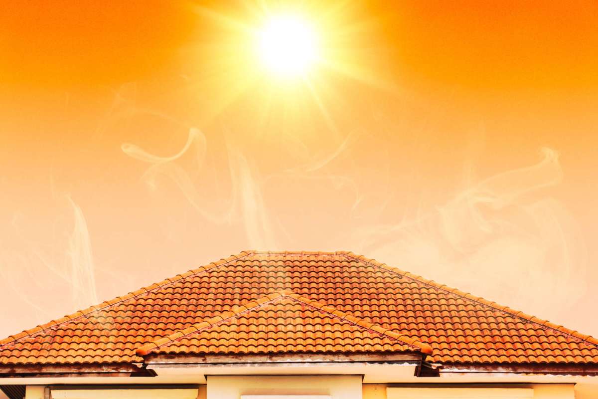 Sun over a roof.