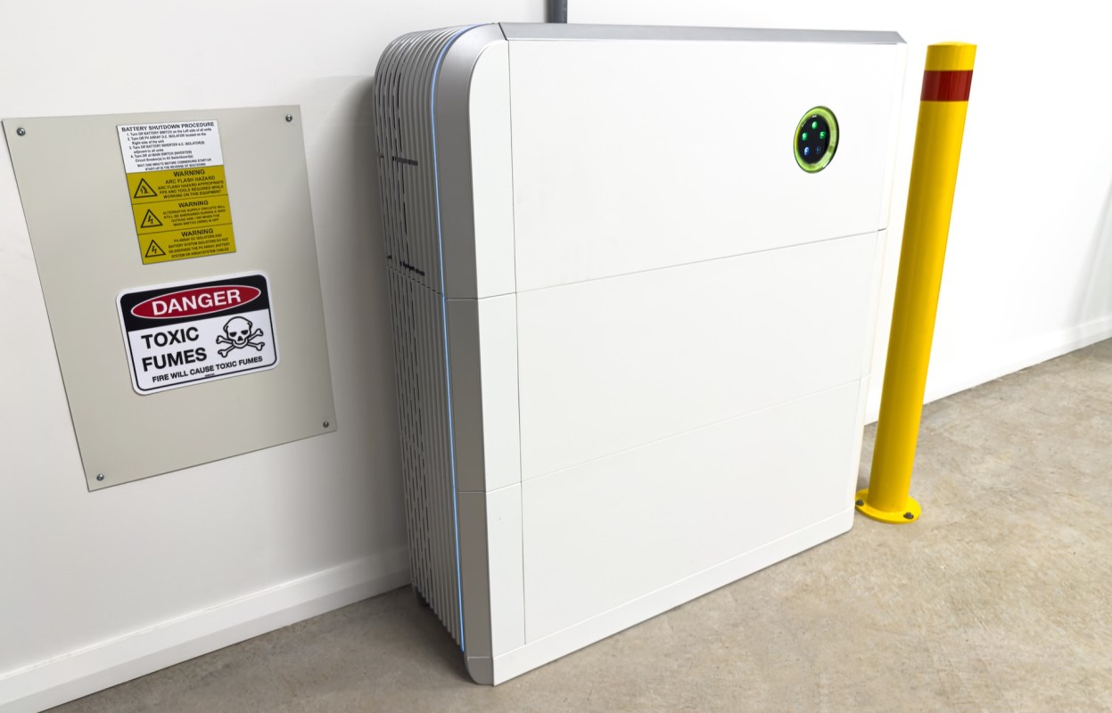 A battery storage unit next to safety information.