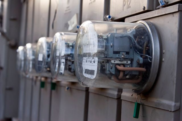 A row of electrical meters.