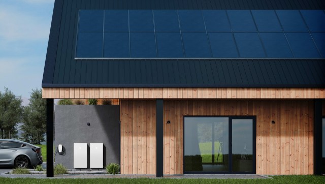 Solar panels and Tesla Powerwalls on a home.